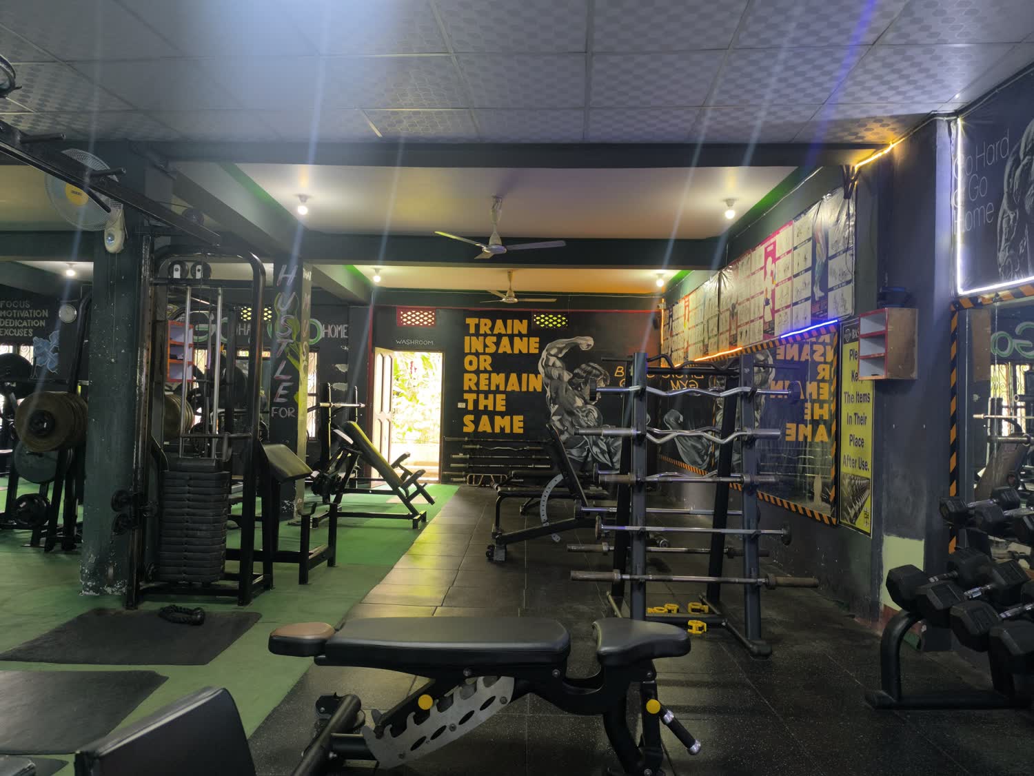 Gym floor and exercise equipment at Basic Gym